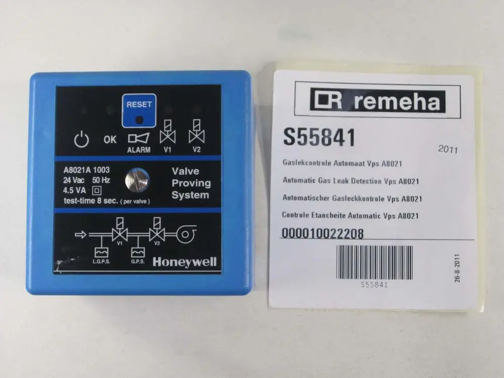 Honeywell Gasleckkontrolle VPS A8021, mit Anzeigeleuchten, Tasten zur Alarm- und Statusanzeige. Etikett von Remeha mit Informationen zur automatischen Gaslecküberwachung.